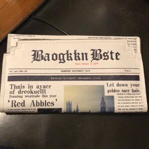 Newspaper clutch handbag purse